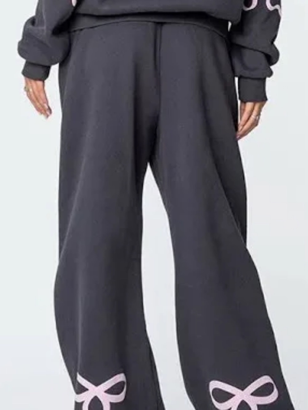 Edikted Wide Leg Black Sweatpants with Pink Bow Hem